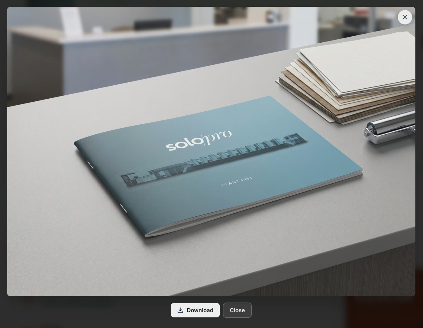 AI-generated product mockup: the uploaded brochure rendered as a saddle-stitched booklet on a desk, with download and close buttons